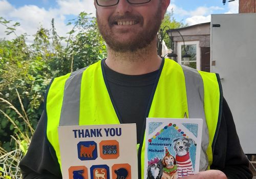 Volunteer Michael with his thank you card from the team